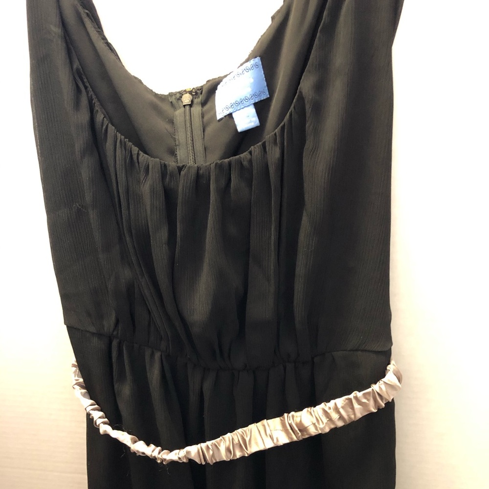 Vera Wang little dress with silver belt.